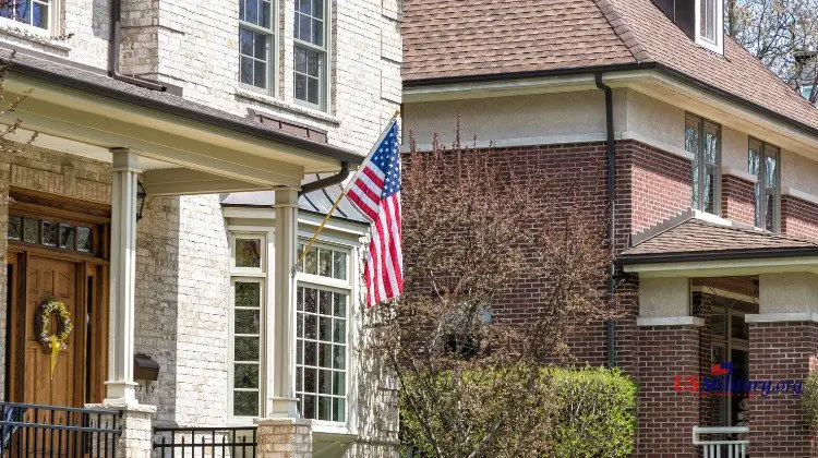 Brick home with USA flag in front