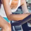 Lululemon military discount 2026 - woman in workout gear on an indoor cycling bike