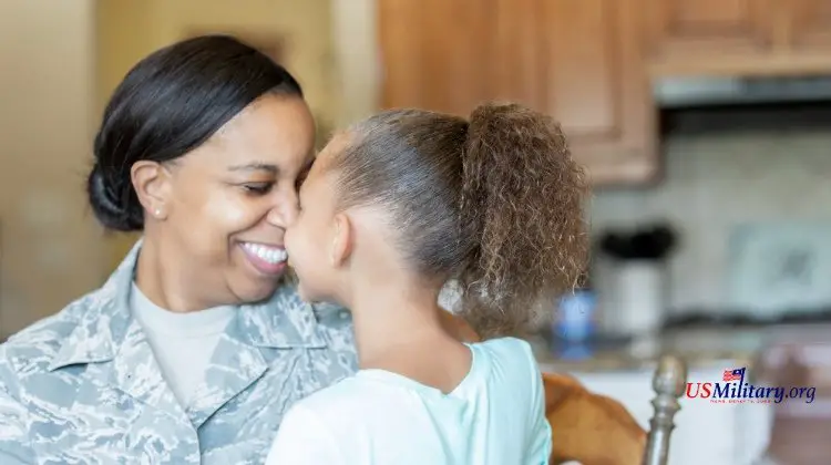 Woman in military uniform with daughter