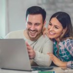 Couple looking at computer