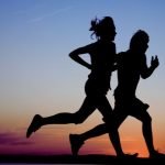 runners at dusk