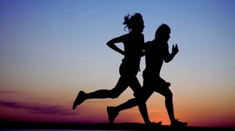 runners at dusk