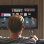 man watching TV