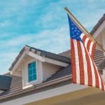 home with US flag in front
