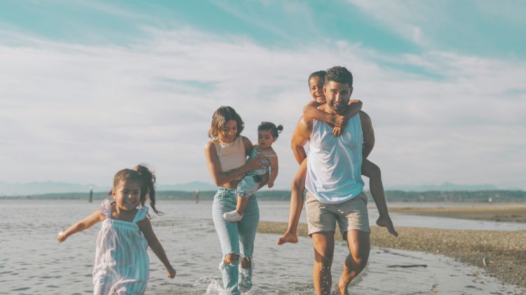 family walking on beach