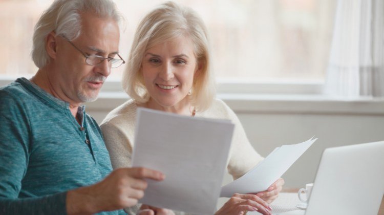 older couple reviewing documents