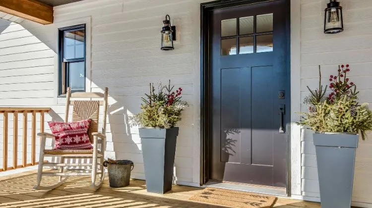 front porch with black door