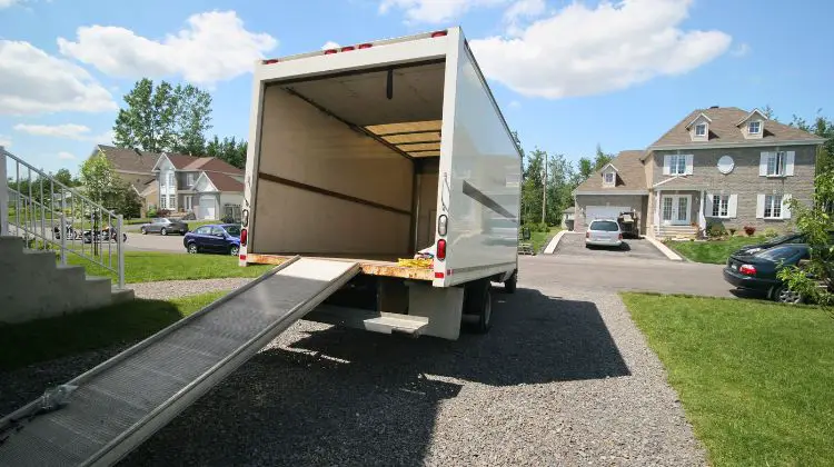 moving truck in driveway