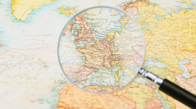 photo of globe with magnifying glass on Europe