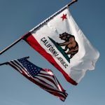 us a flag under blue sky during daytime