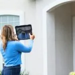 woman performing home appraisal