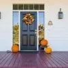 front door of a home with fall decor