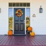 front door of a home with fall decor