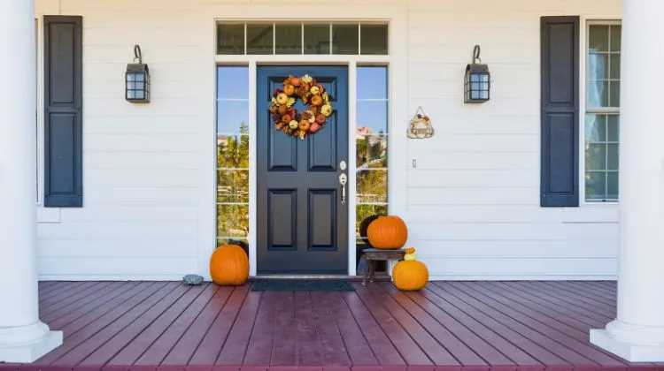 front door of a home with fall decor